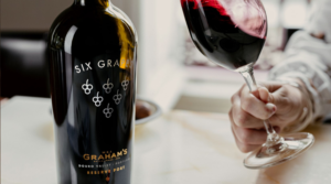 a bottle of graham's six grapes reserve port